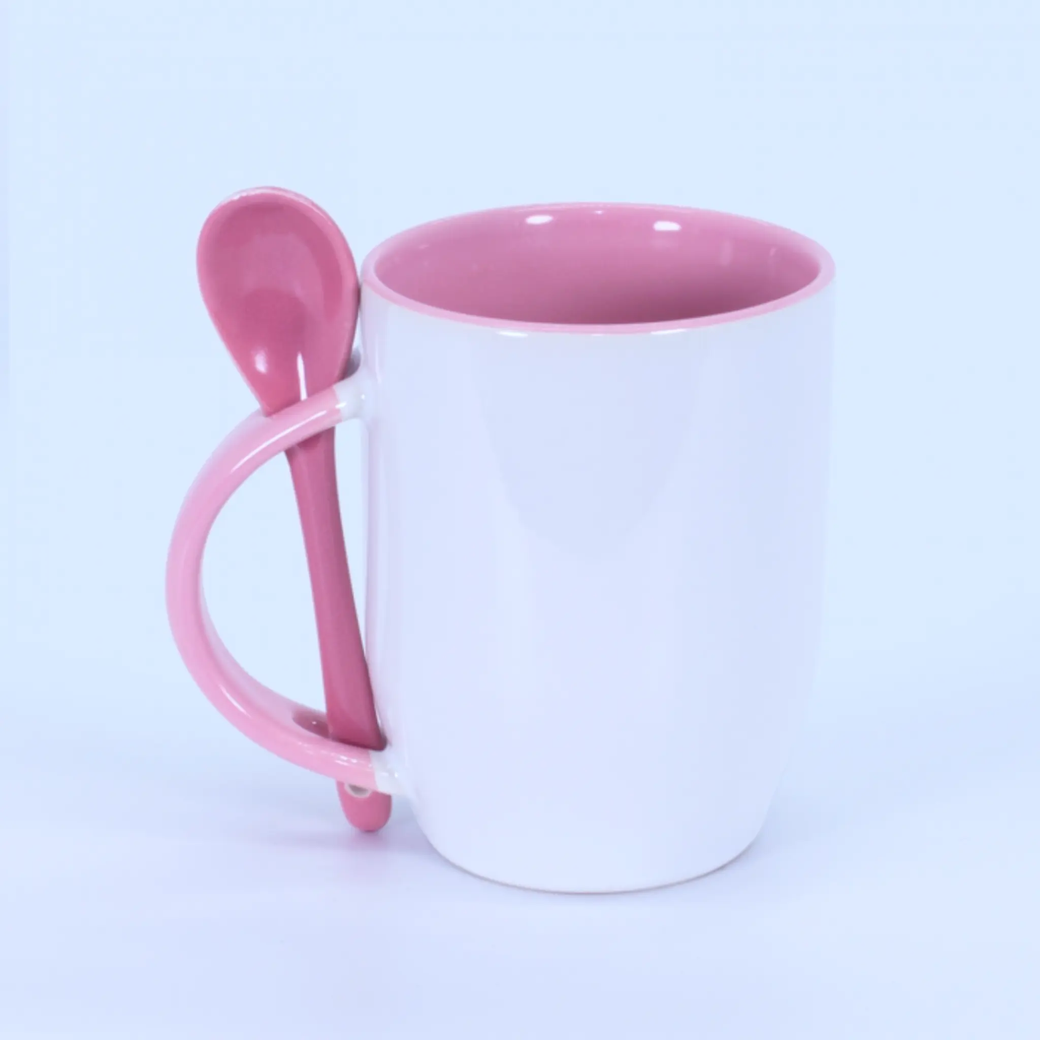 Tazón con cuchara rosado sin impresión.