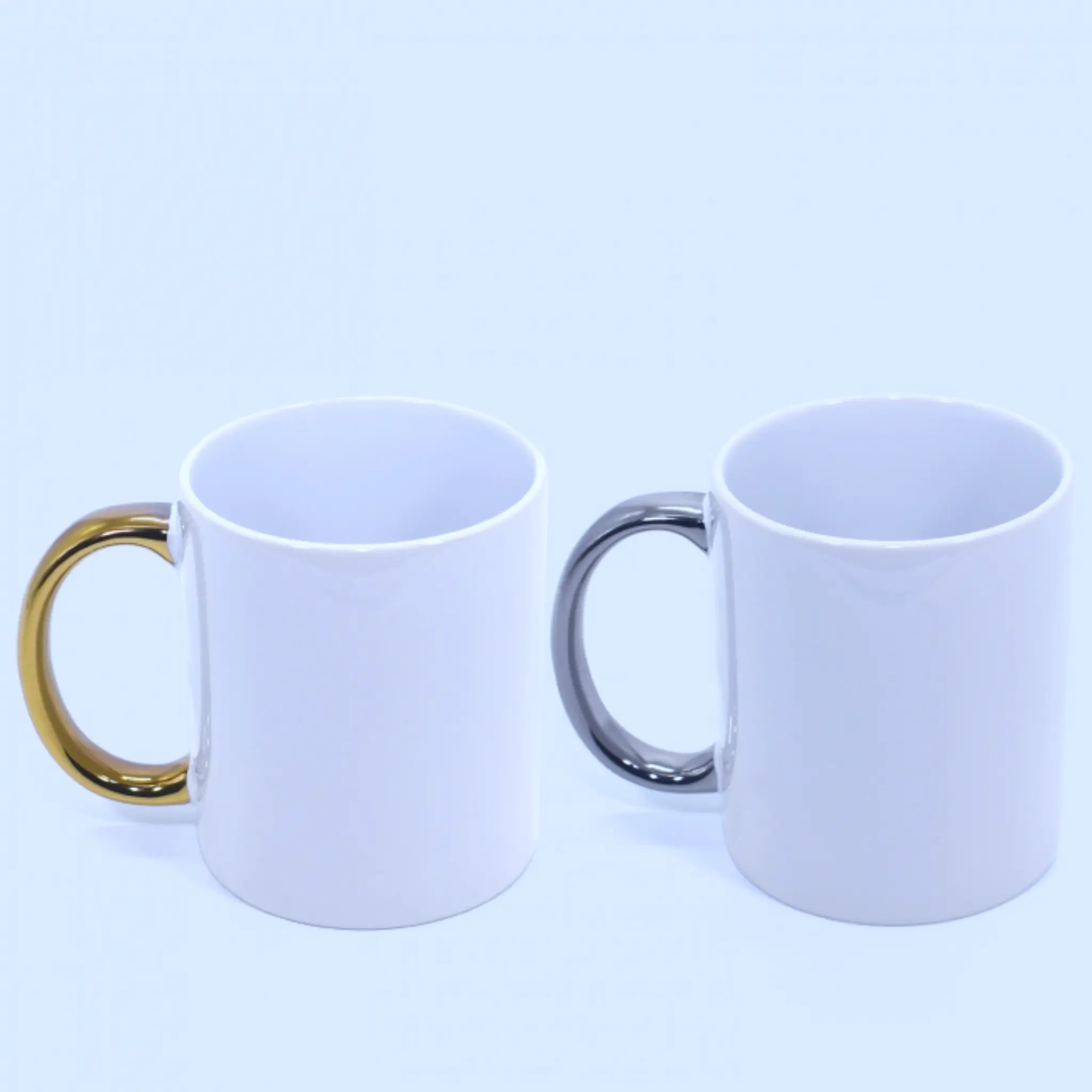 Tazones mango metálico personalizados en dorado y plateado, vista frontal sin diseño.