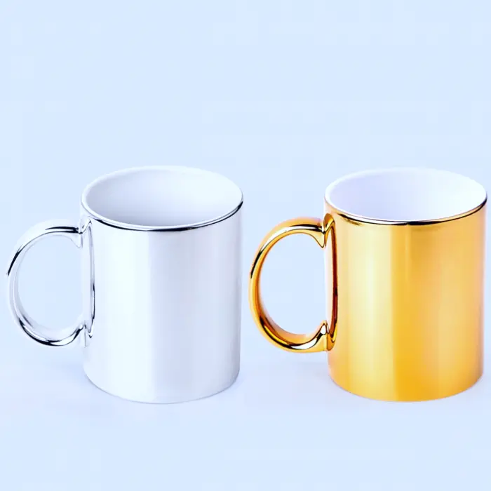 Tazones metálicos personalizados en colores dorado y plateado, mostrados juntos en vista frontal.